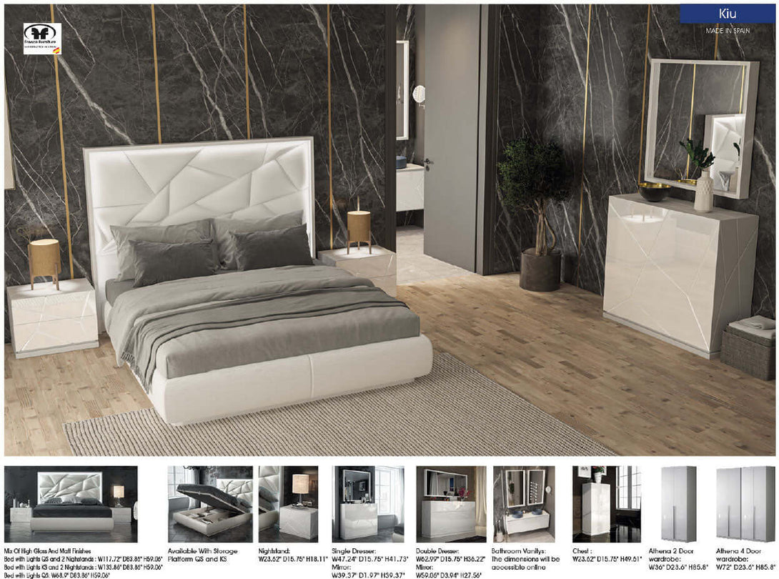 Modern bedroom setup with a bed, nightstands, and dresser against a marble wall.