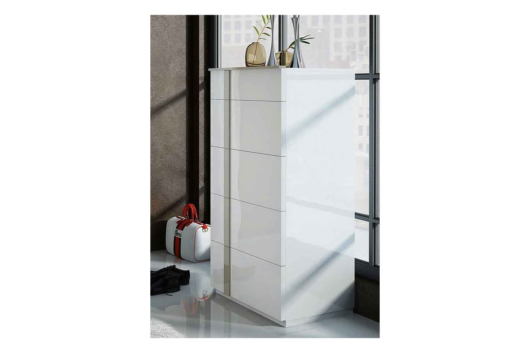 White dresser with high-gloss doors in a modern room setting