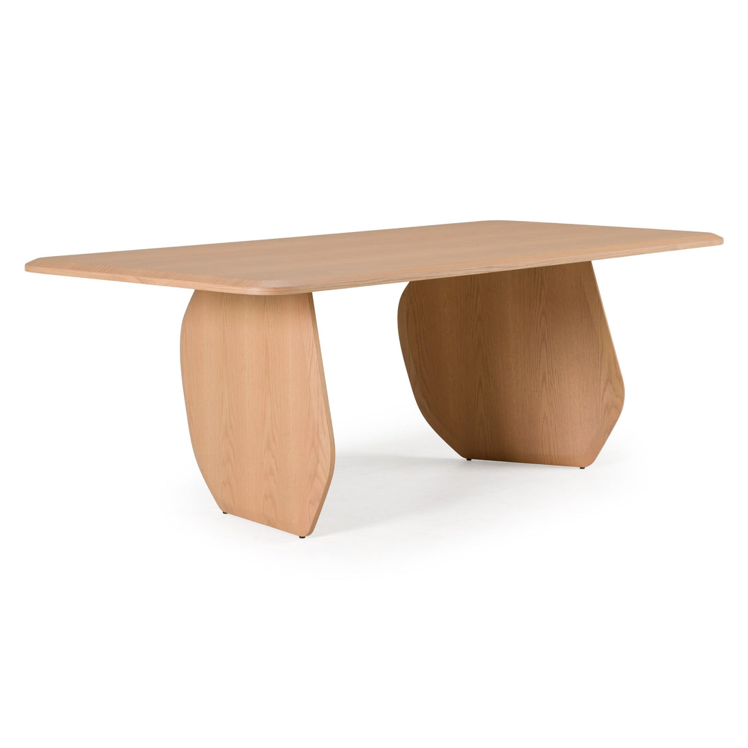 Wooden table with unique base design on a white background