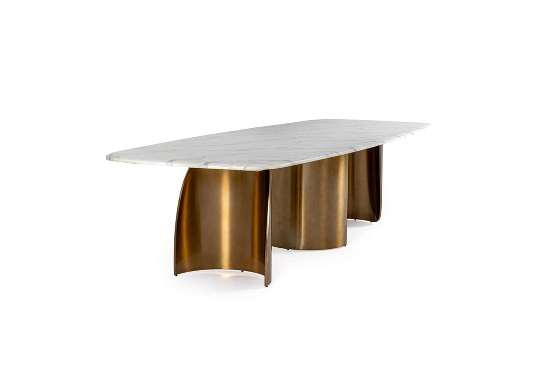 Modern table with white top and bronze metal base on a white background