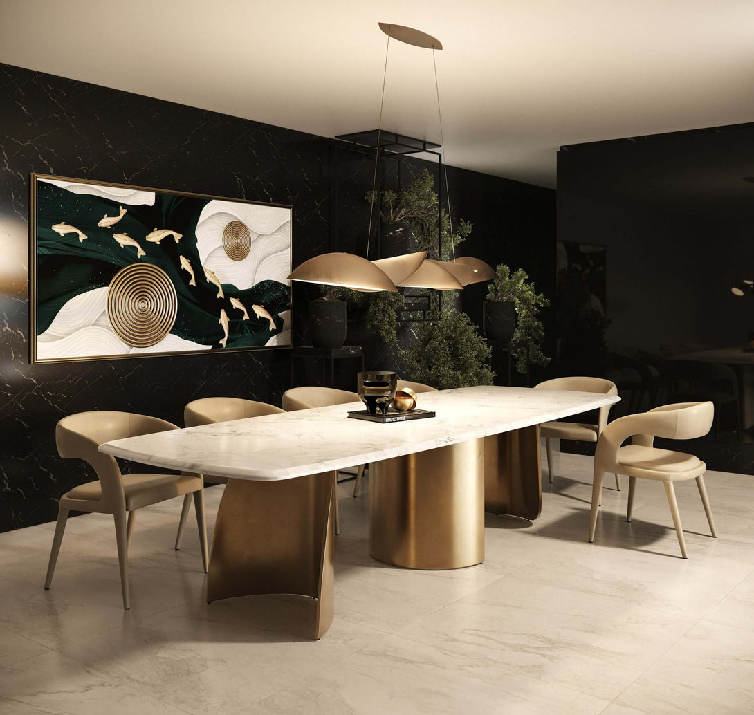 Modern dining room with a marble table and bronze legs, surrounded by chairs.