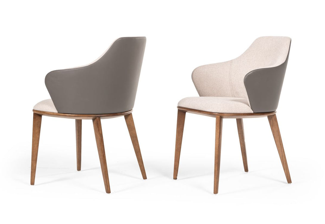 Modrest Megan Mid-Century Modern Walnut Dining Chairs - Angled view of 2 dining chairs on a white transparent background