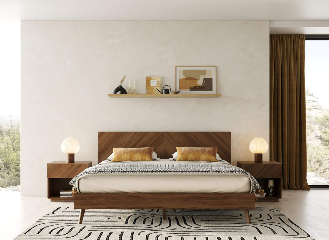 Modern bedroom with wooden bed and side tables, featuring a neutral color palette.