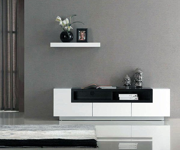 TV023 Wall Unit TV Stand in White Lacquer Finish and Dark Oak - Front View in a Demo Room