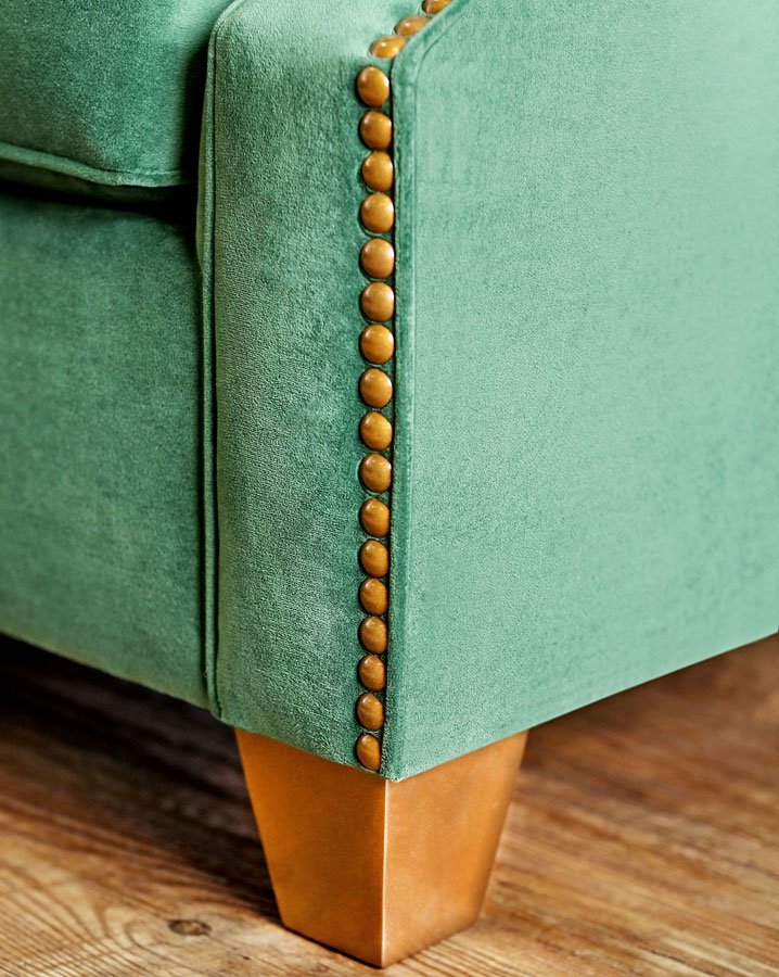 Verdante Living Room Set in Emerald Green Microfiber - Close-up View of Microfriber Material and Gold Furniture Tacks 3