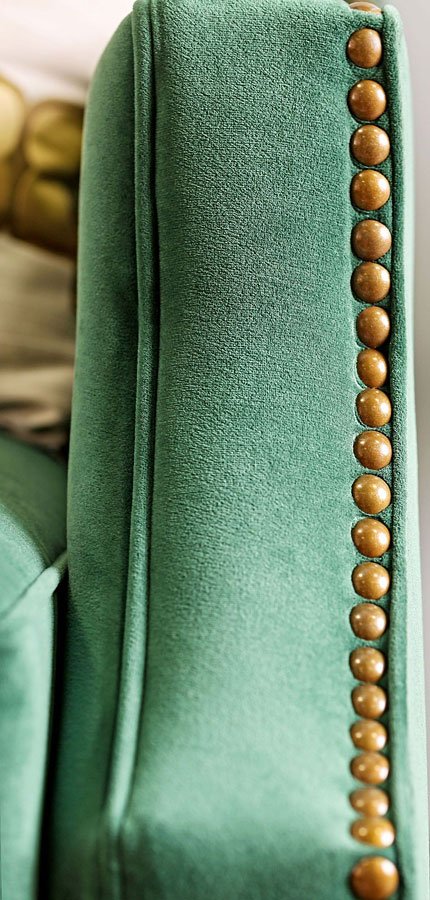 Verdante Living Room Set in Emerald Green Microfiber - Close-up View of Microfriber Material and Gold Furniture Tacks 2
